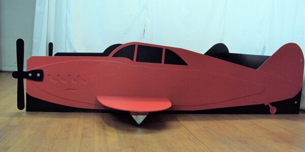 Red propeller plane bed frame side view