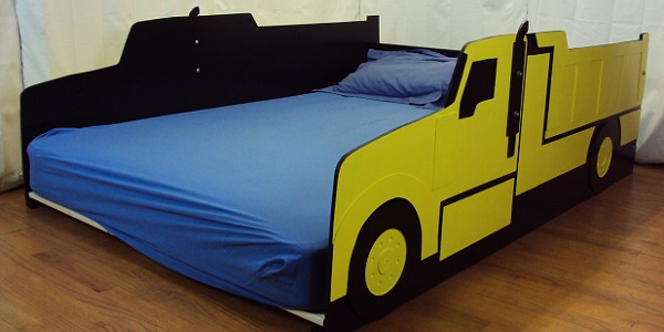 yellow dump truck bed side view