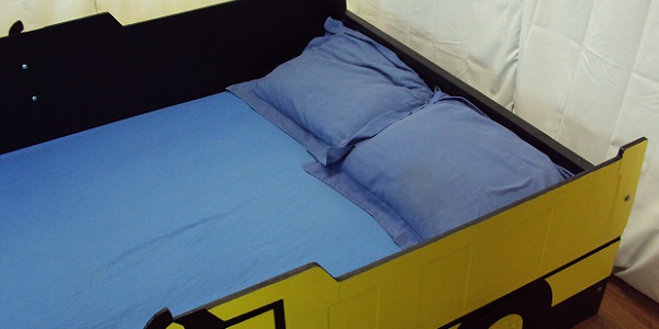 yellow full size dump truck headboard