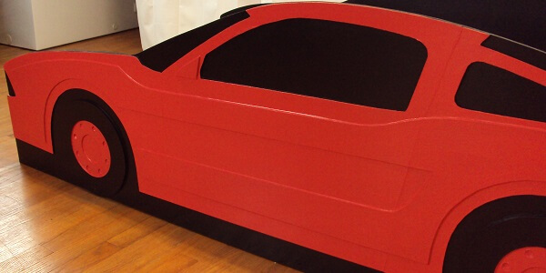 red car view down side toward front