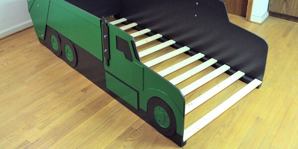 twin green garbage truck bed