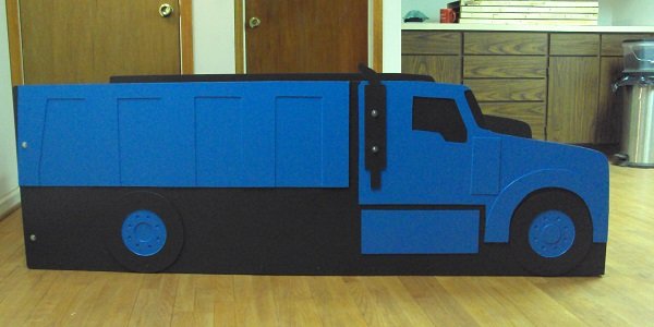 blue dump truck bed side